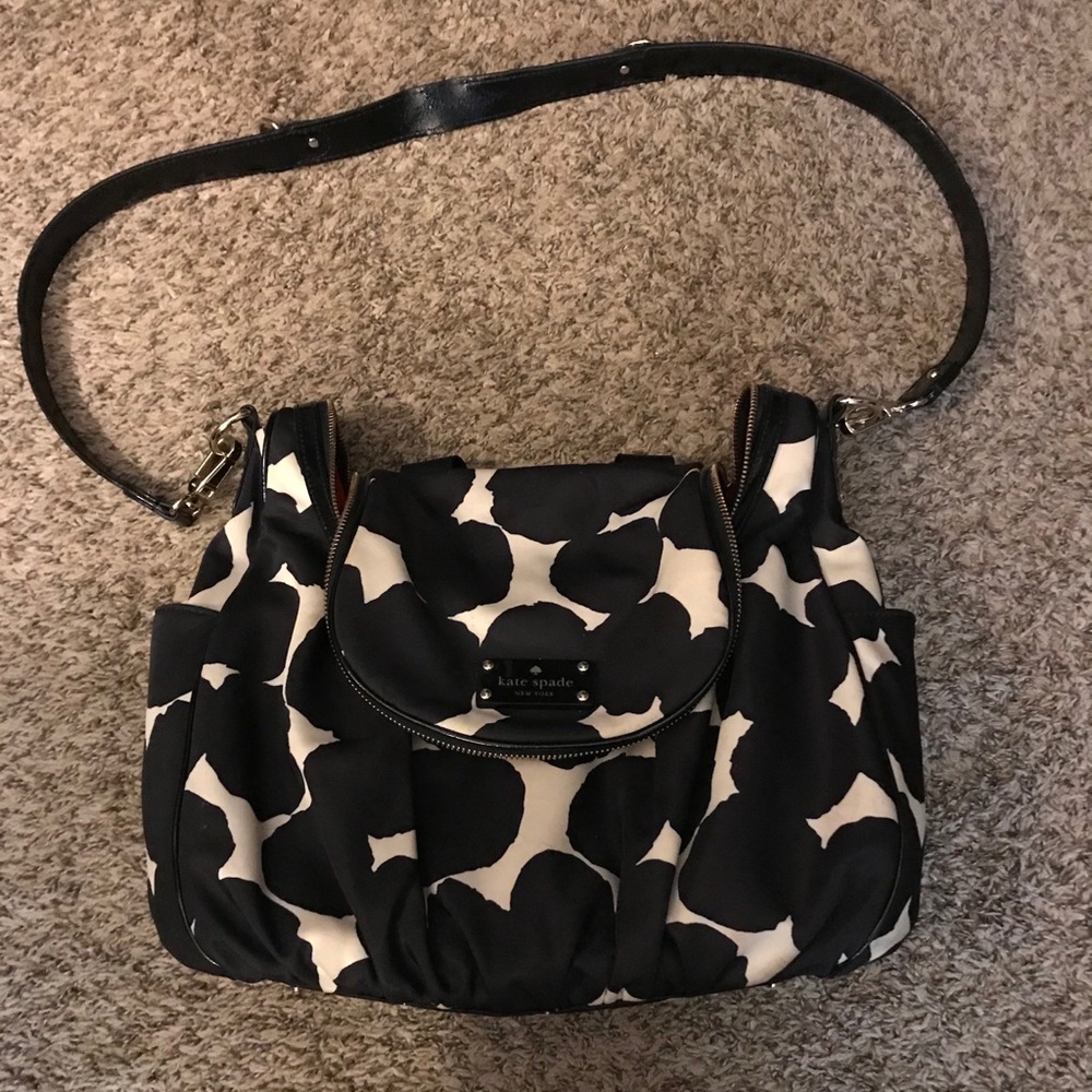 Kate spade crossbody diaper bag with changing pad.